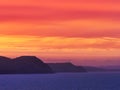 Fiery Dawn Clouds on an April Sunrise over the Jurassic Coast