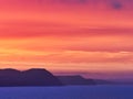 Fiery Dawn Clouds on an April Sunrise over the Jurassic Coast