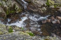 Stormy stream among rocks and boulders Royalty Free Stock Photo