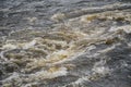 Stormy streams of gray water on pitfalls