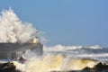 Stormy wave over lighthouse of San Esteban de Pravia.