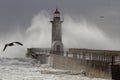 Stormy wave splash and spray at old lighthouse Royalty Free Stock Photo