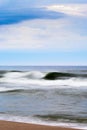 Stormy waves of the Baltic sea. Seascape with waves blurred by long exposure. Royalty Free Stock Photo