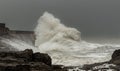 stormy waves hitting a light house Royalty Free Stock Photo