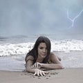 Stormy Weather Beach Shore with Young Woman