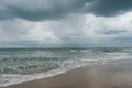 Stormy weather over the ocean on a beach Royalty Free Stock Photo