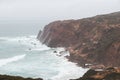 Stormy weather over the rocky cliffs of southwest Portugal\'s Algarve region. The power of the ocean.