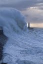 Stormy weather at Porthcawl lighthouse, South Wales, UK.