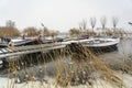 On this stormy winter day, the drifting snow covers the boats at lake Zoetermeerse Plas in Zoetermeer