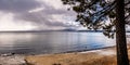 Stormy winter day on the shoreline of Lake Tahoe, Sierra mountains, California Royalty Free Stock Photo