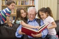 Story time with grandpa Royalty Free Stock Photo