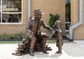 `Storyteller` by Scott Stearman in the front of the Bethany Library in Bethany, Oklahoma.