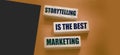 Storytelling is the best Marketing words on wooden blocks. The motivational marketing piar advertising concept