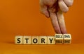 Storytelling or storyselling symbol. Male hand turns wooden cubes and changes the word `storytelling` to `storyselling`. Beaut Royalty Free Stock Photo