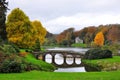 Lake and Bridge in Autumn, Stourhead Gardens, Stourton, Warminster, Wiltshire, England, UK