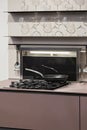 Stove closeup in modern kitchen interior with stainless steel gas cook top Royalty Free Stock Photo