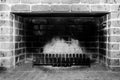 Stove fire for winter, Tradional Wood Burning Stove in a Brick Fireplace Royalty Free Stock Photo