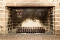 Stove fire for winter, Tradional Wood Burning Stove in a Brick Fireplace Royalty Free Stock Photo