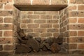 Stove fire for winter, Tradional Wood Burning Stove in a Brick Fireplace Royalty Free Stock Photo