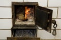 Close up open stove with open fire Royalty Free Stock Photo