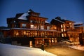 Stowe Mountain Ski Resort in Vermont, Empty Spruce peak village log houses at night Royalty Free Stock Photo