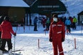 Stowe staff person wearing mask at Fourrunner quad lift entrance at Stowe Ski Resort in Vermont