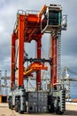 Straddle carrier used for moving containers in a container terminal. Port of Rotterdam, Netherlands. September 6, 2015