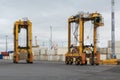 Straddle carriers in a busy port