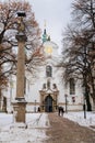 Strahov Monastery with White Baroque church, Premonstratensian abbey in Bohemia under snow, Basilica of the Assumption of Virgin