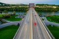 Straight On Angle Aerial Pennybacker Bridge at sunset with cars showing motion from Long Exposure taken by Drone