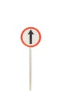 Straight arrow with red edge circular badge with old rusted iron pole. Traffic sign signage. isolated with white background Royalty Free Stock Photo