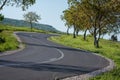 Straight asphalt road leading into the distance Royalty Free Stock Photo