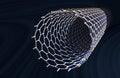 Straight Carbon Nanotube, Yellow Atoms, Grey and Blue Bonds, Dark Blue Background