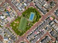 Straight down drone shot of empty mini soccer field and tenis court