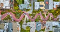 Straight down view Lombard Street with cars driving down red brick road aerial