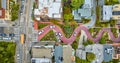 Straight down view Lombard Street top of hill with cars driving down red brick road aerial Royalty Free Stock Photo