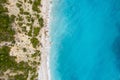 Straight down view on waves on rocky shore by Bunec Beach area in Summer 2022, Albania Royalty Free Stock Photo