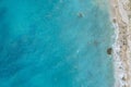 Straight down view on waves on rocky shore by Bunec Beach area in Summer 2022, Albania Royalty Free Stock Photo