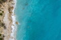 Straight down view on waves on rocky shore by Bunec Beach area in Summer 2022, Albania Royalty Free Stock Photo