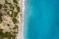 Straight down view on waves on rocky shore by Bunec Beach area in Summer 2022, Albania Royalty Free Stock Photo