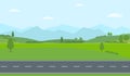 Straight empty road through the countryside. Green hills, blue sky, meadow and mountains. Royalty Free Stock Photo