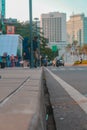 straight line sidewalk with highway