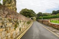 Straight Narrow Road Lined with Stone Walls