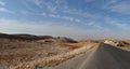 Straight road in the desertic landscape of Mount Lebanon in summer, Faraya, Lebanon