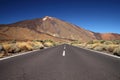 Straight road with El Teide in the background, Tenerife, Canary Islands. Royalty Free Stock Photo