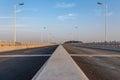 A straight road leading to the distance on a bridge Royalty Free Stock Photo