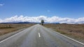 Straight road in New Zealand scenic highway. Royalty Free Stock Photo