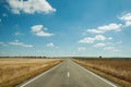 Straight road through rural landscape near the Monfrague National Park Royalty Free Stock Photo