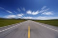 Straight road under blue sky Royalty Free Stock Photo