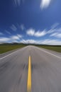 Straight road under blue sky Royalty Free Stock Photo
